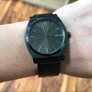 Black metal Nixon watch